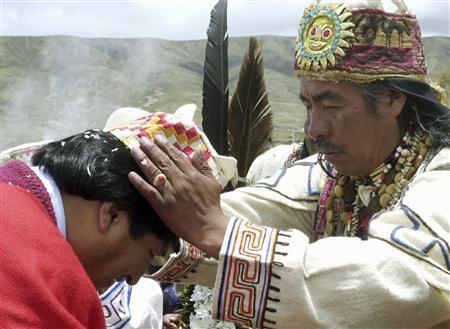 File photo of Bolivian President-elect Morales being blessed by Aymara priest Valentin Mejillones during a ceremony at Tiawanaku